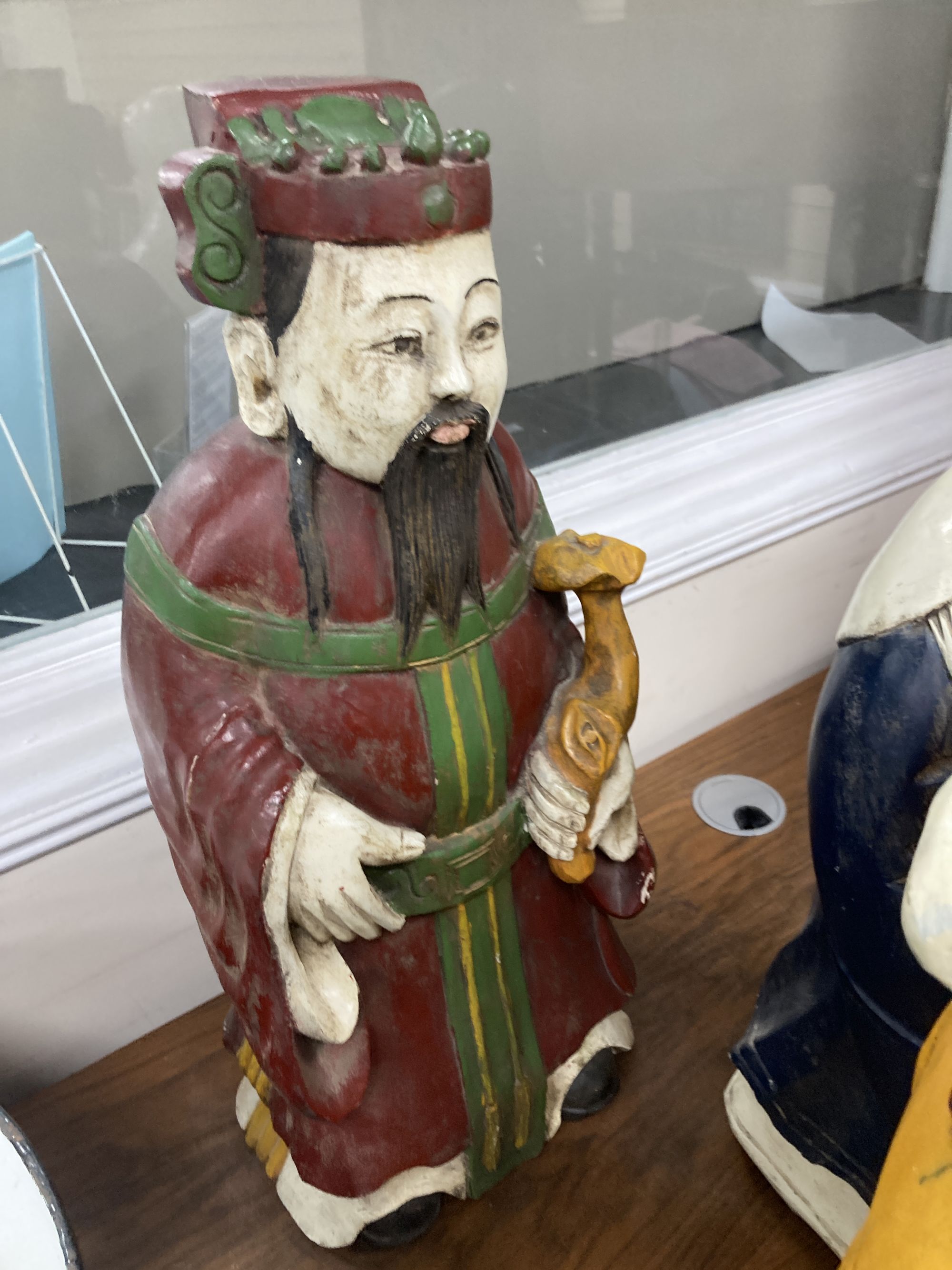 A trio of polychrome painted carved Chinese hardwood figures, tallest 67cm